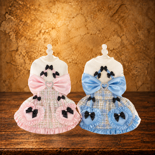 Luxury Tweed Dog Dress with Satin Bow displayed on the antique table