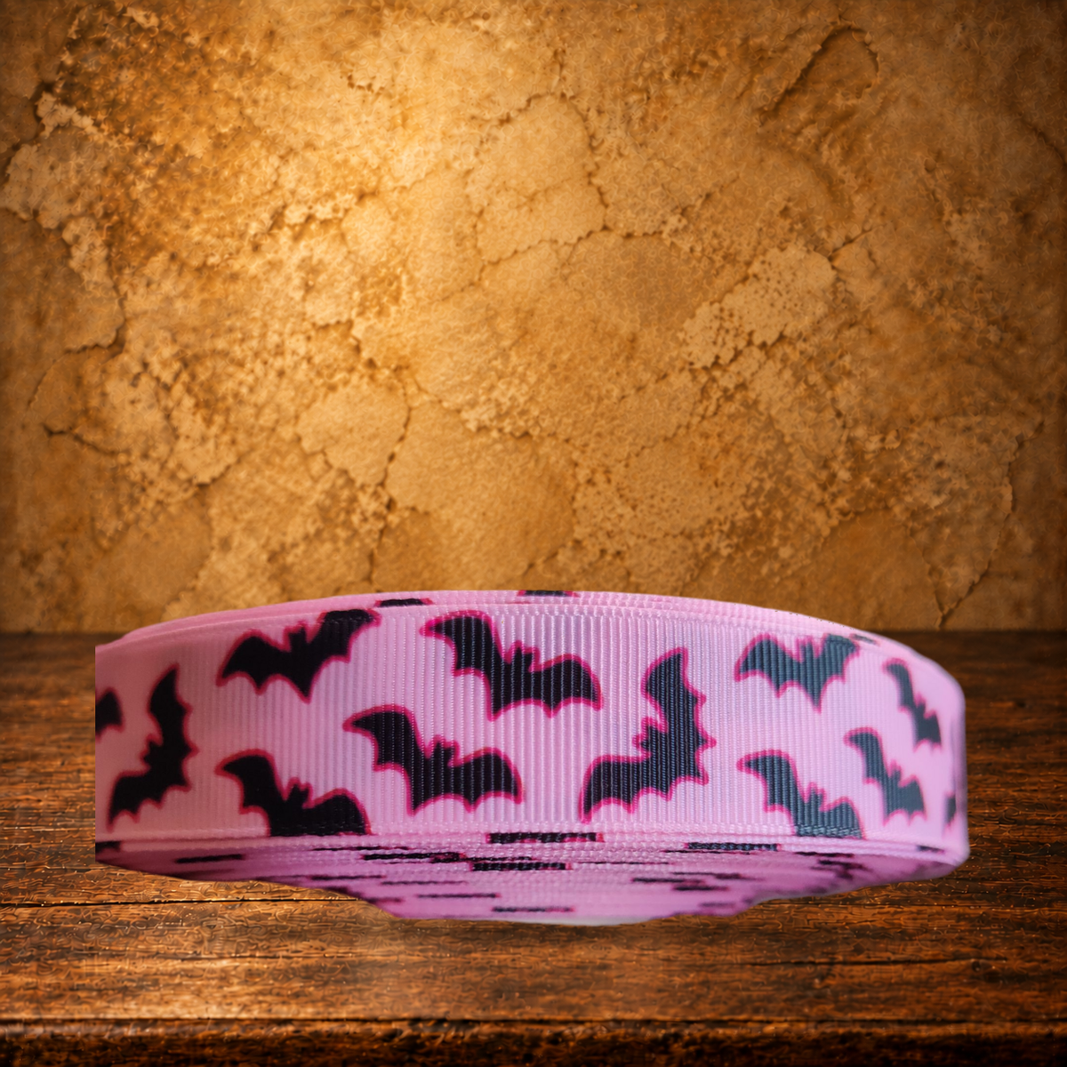 Pink Bats Nylon Dog Collar & Leash displayed on the antique table