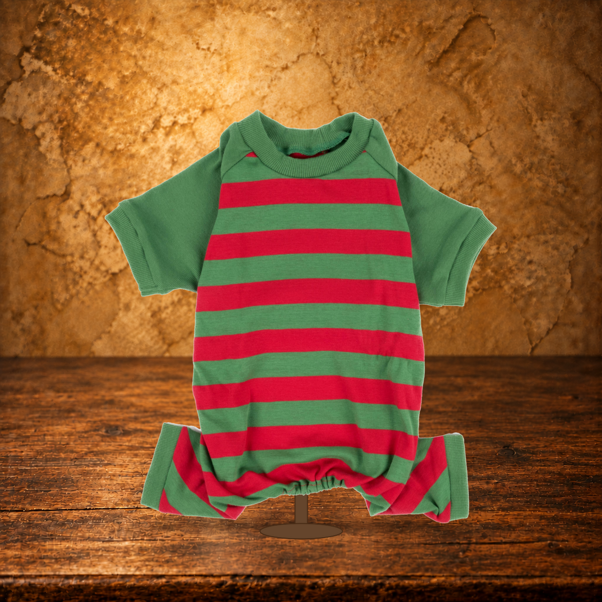 Red & Green Striped Dog Pajamas displayed on the antique table