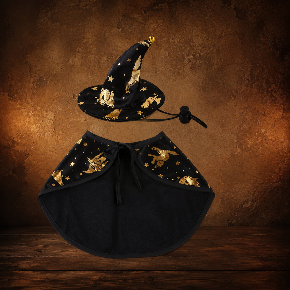 The Familiar’s Wizard Hat & Cloak on an antique Pate’s Pugorium backdrop