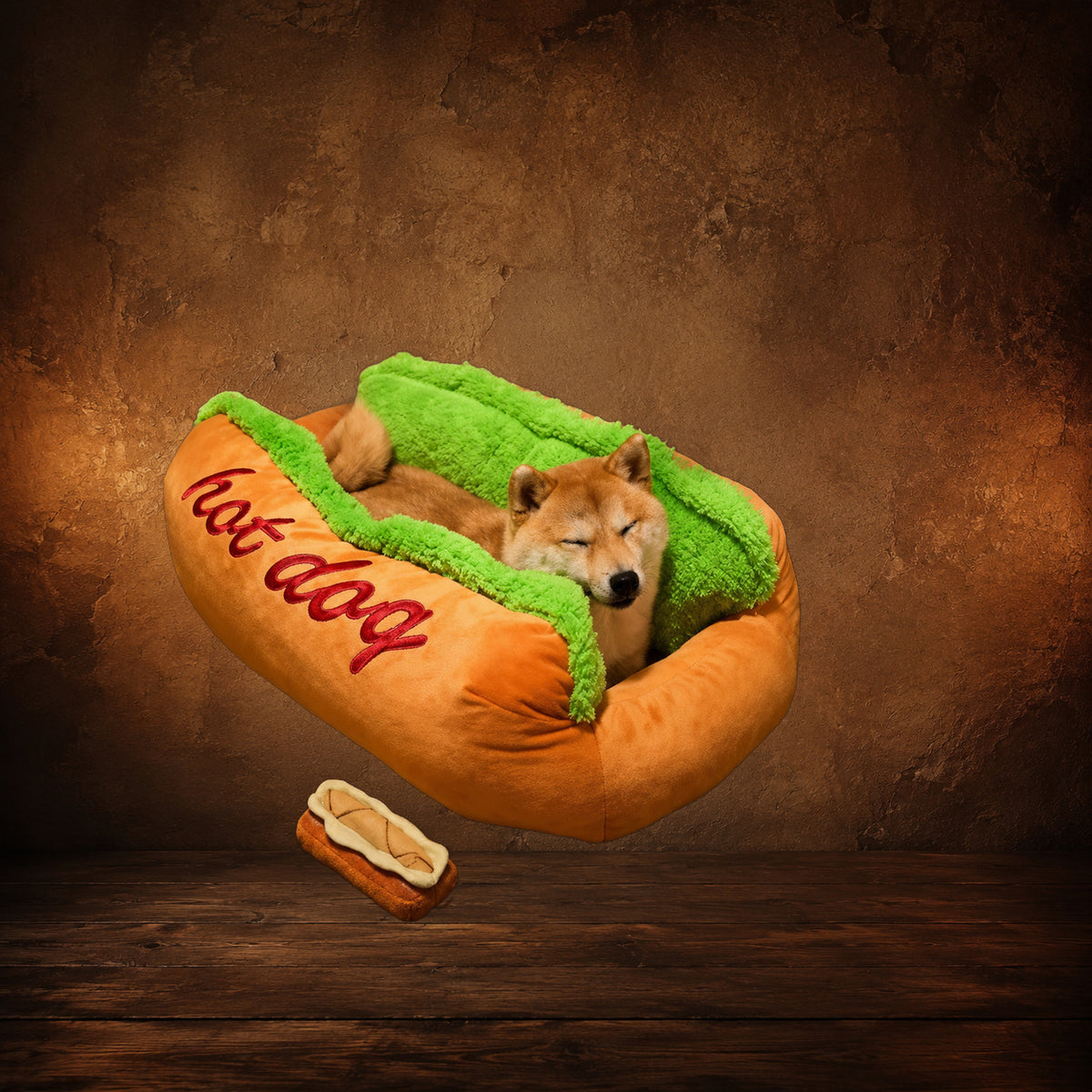 The Frankfurter Fainting Couch — Hot Dog Pet Bed on an antique Pate’s Pugorium backdrop