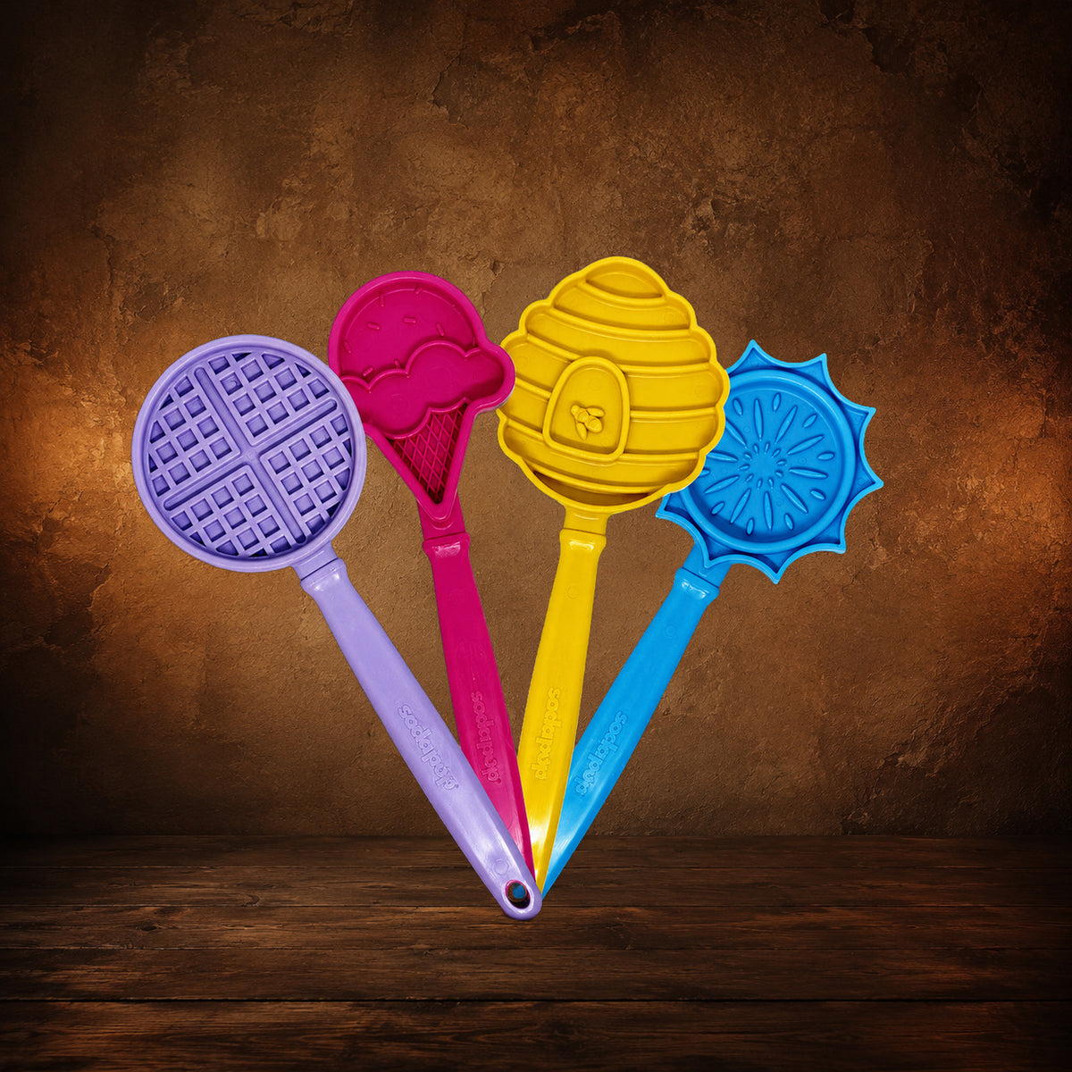 The Distraction Wand — Handheld Lick Toy on an antique Pate’s Pugorium backdrop