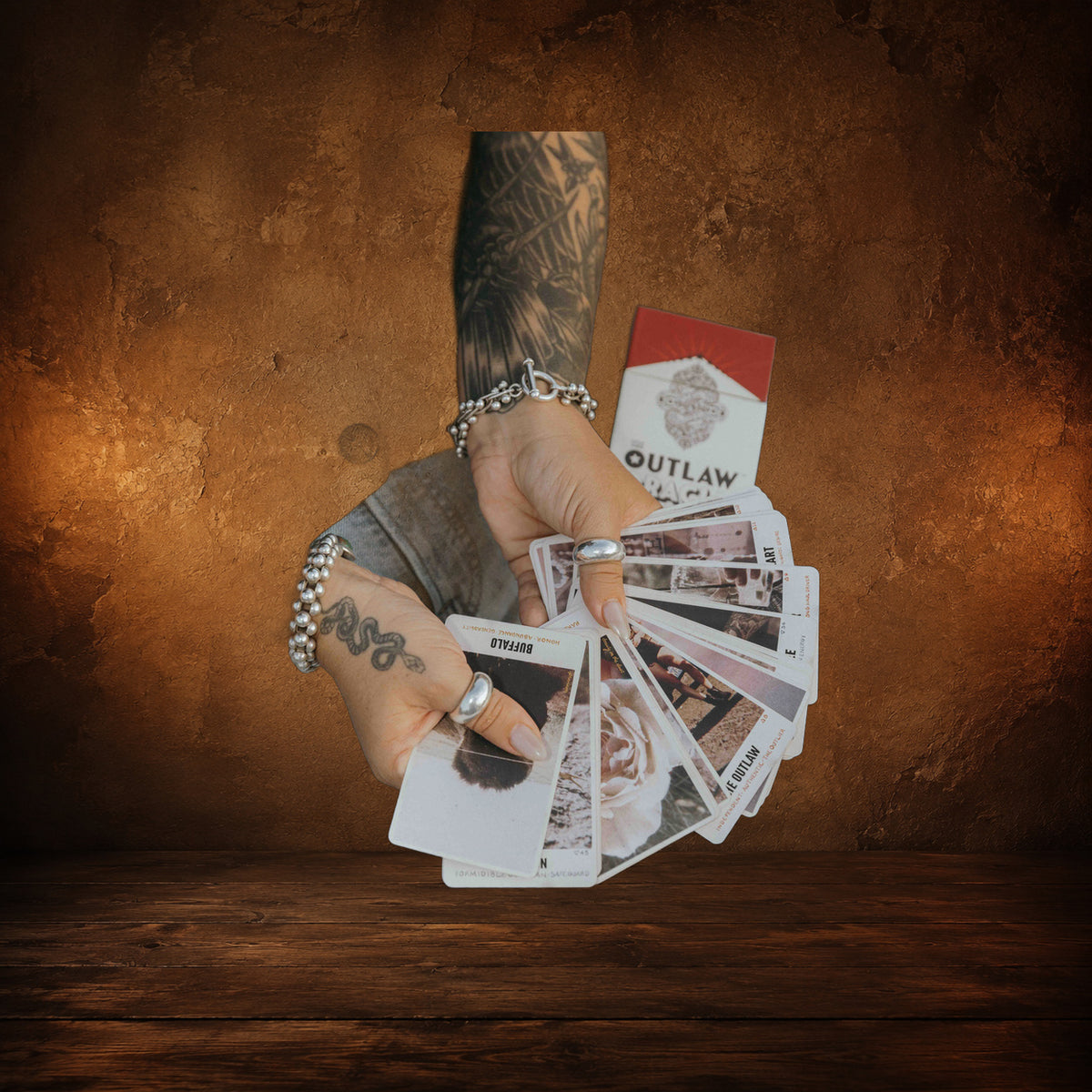 The Outlaw Intuition — Country & Western Oracle Deck on an antique Pate’s Pugorium backdrop