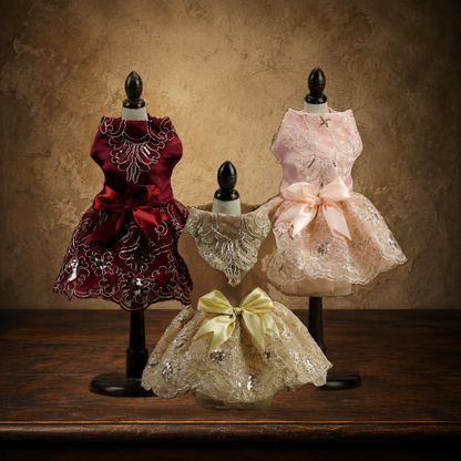The Pugorium Evening Gown displayed on the approved antique plaster and walnut table