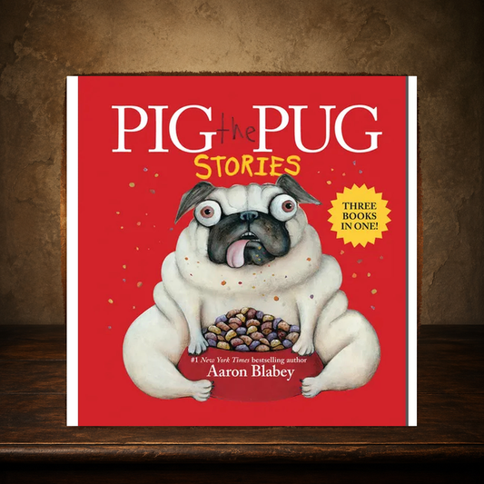 The Mischievous Pug Treasury — Three Pig the Pug Stories displayed on the approved antique plaster and walnut table