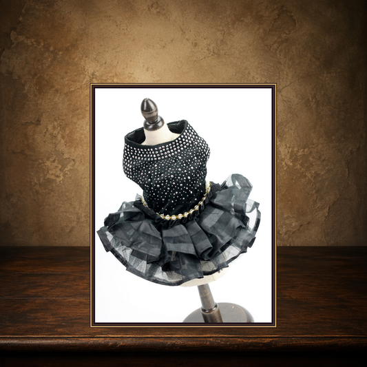 The Black Chapel Wedding Dress displayed on the approved antique plaster and walnut table