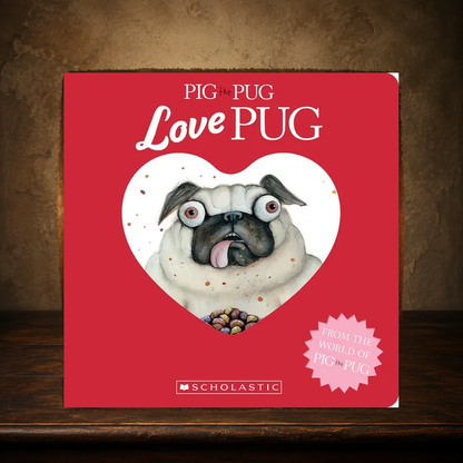 The Little Love Pug — Pig the Pug Board Book displayed on the approved antique plaster and walnut table