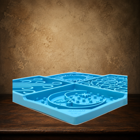 The Celestial Supper — Enrichment Lick Mat displayed on the approved antique plaster and walnut table