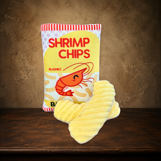 The Contraband Shrimp Chips — 2-Piece Crinkle Toy on the approved antique plaster and walnut backdrop