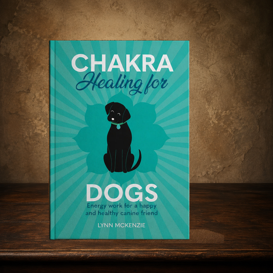 The Seven Centers — Chakra Healing for Dogs displayed on the approved antique plaster and walnut table