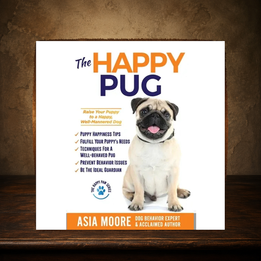 The Happy Pug — Puppy-Raising Guide displayed on the approved antique plaster and walnut table