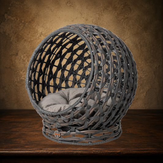 The Wicker Observatory Bed displayed on the approved antique plaster and walnut table