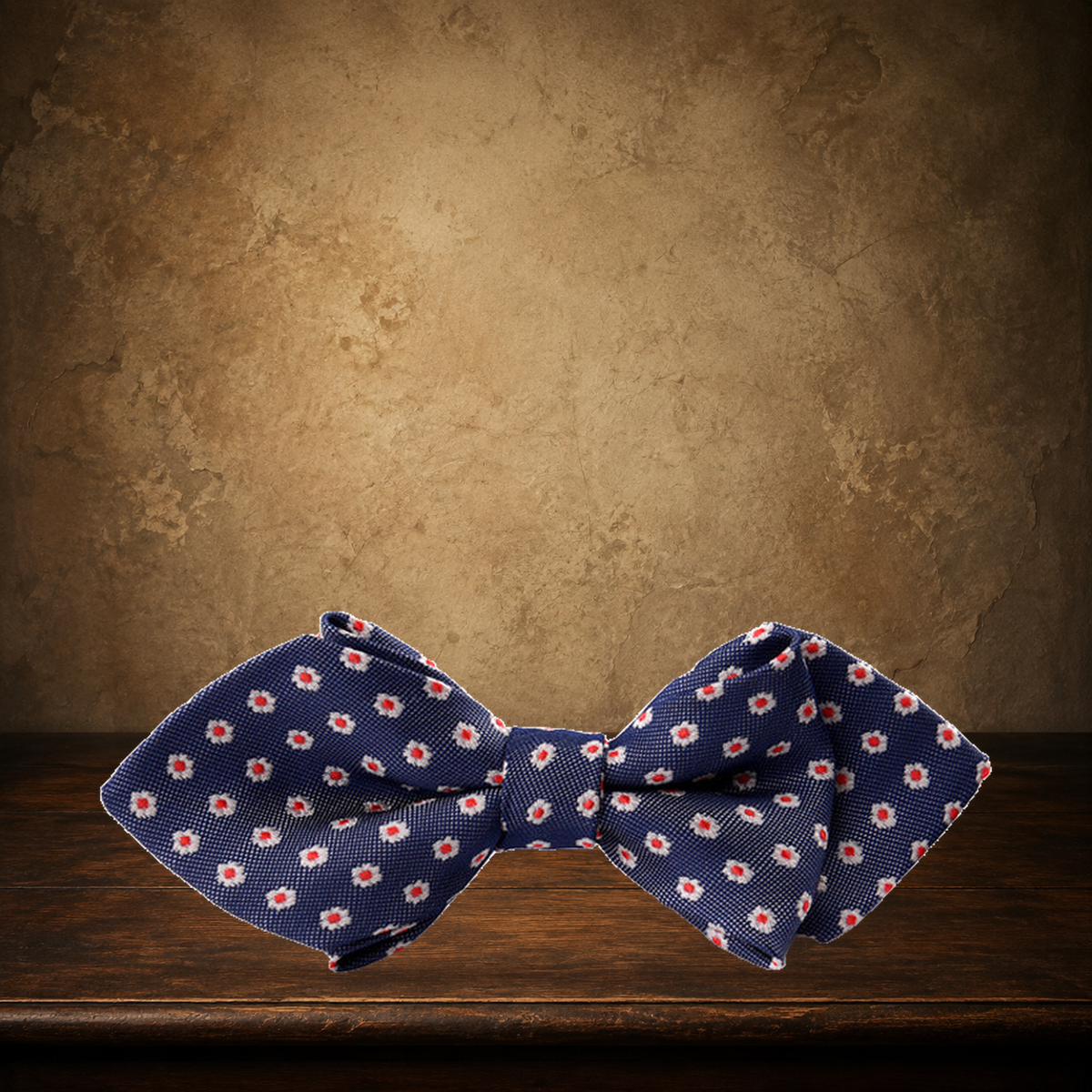 The Proper Little Bow Tie displayed on the approved antique plaster and walnut table
