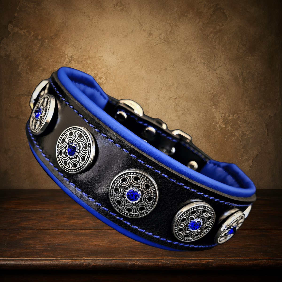 The Bijou — Black & Blue Leather Collar on the approved antique plaster and walnut backdrop