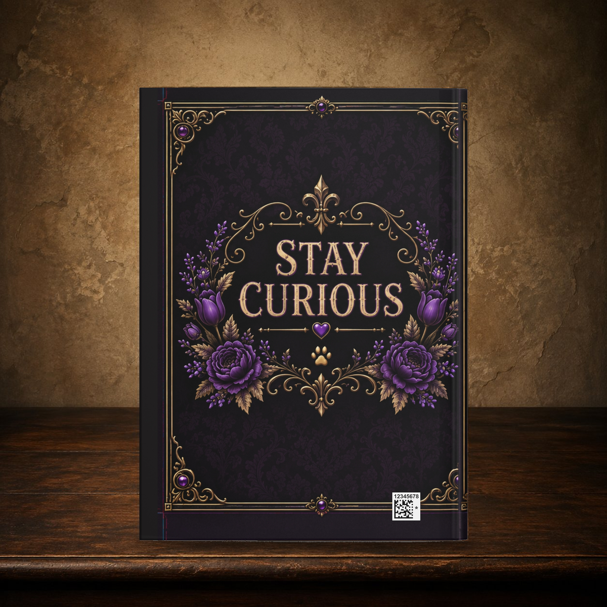 Veronica journal with the matching Stay Curious back on the antique table