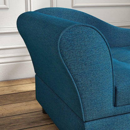 Close view of the curved back and teal woven upholstery