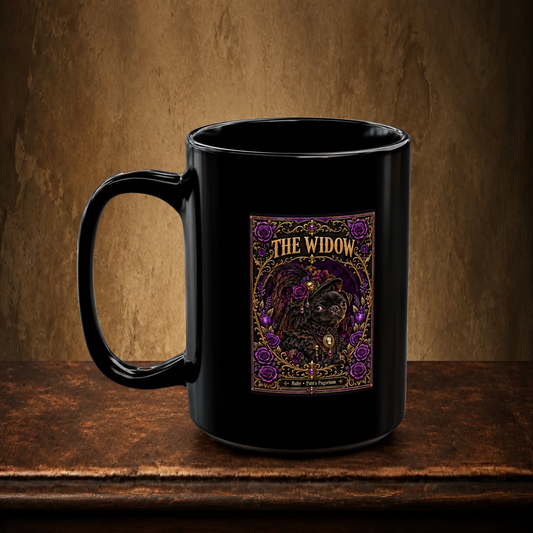 The Widow 15 oz black mug resting on a walnut tabletop against an antique plaster wall