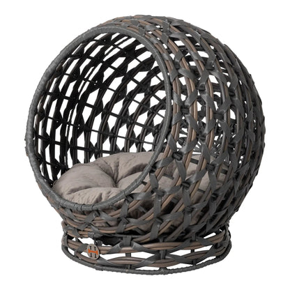 Front three-quarter view of the charcoal woven Wicker Observatory Bed and gray cushion