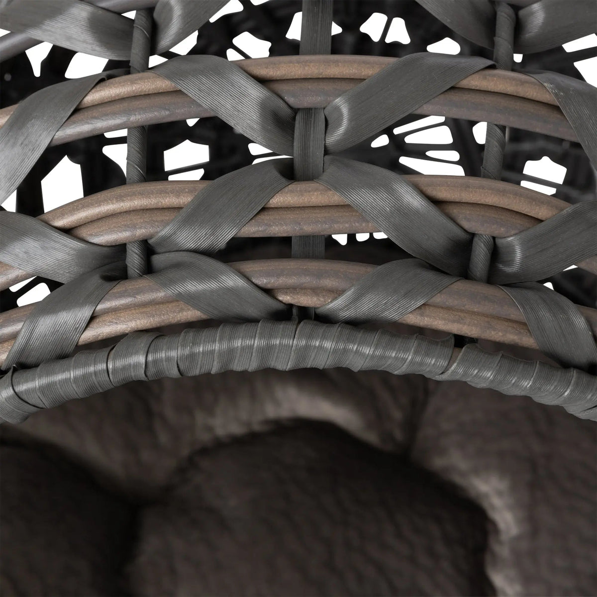 Close view of the charcoal and smoky-brown woven frame construction